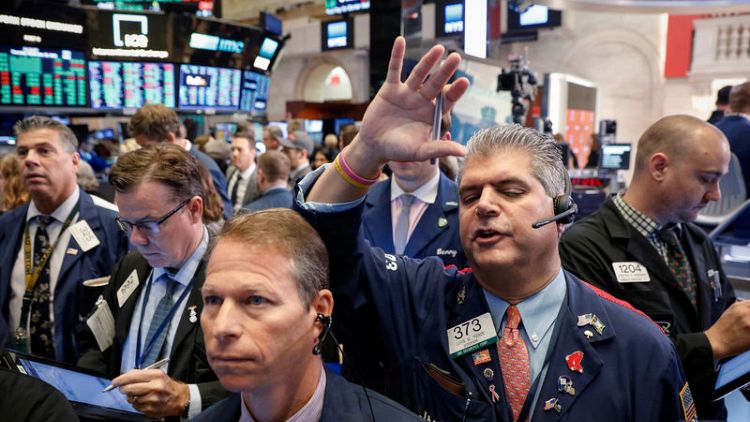 Stocks hit new highs as trade worries ease, dollar slips