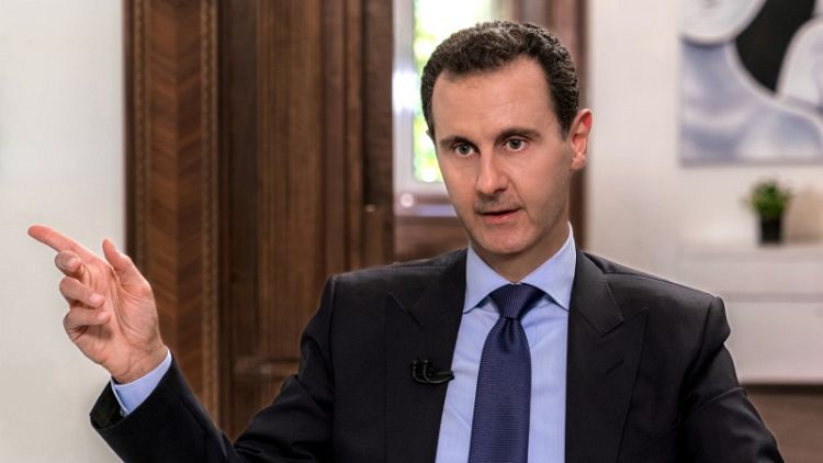 إنترفاكس: الكرملين تلقى برقية من الأسد بشأن إسقاط الطائرة الروسية