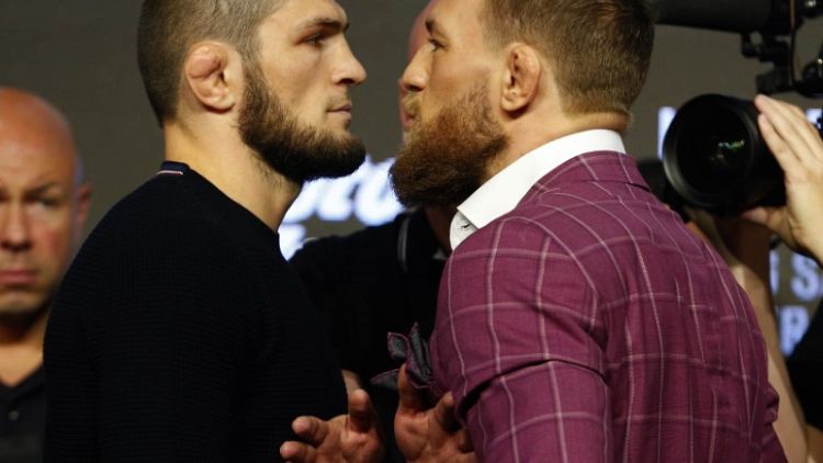 Mixed Martial Arts-McGregor promotes fight, whiskey at raucous press conference