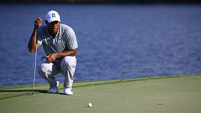 Woods, Rose tied for halfway lead at Tour Championship