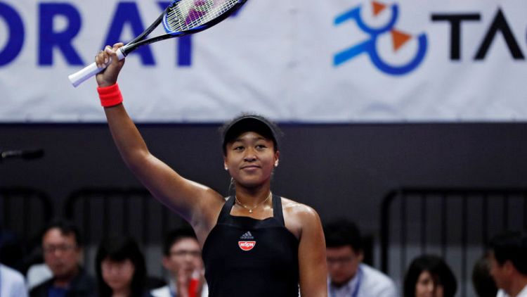 Tennis - Osaka wins 10th straight match to power into Tokyo final