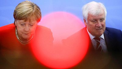 German coalition's future at stake as parties again try to resolve spymaster affair