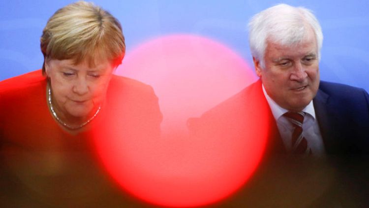 German coalition's future at stake as parties again try to resolve spymaster affair