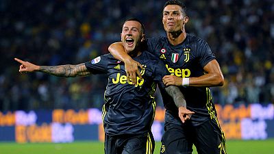 Juventus maintain perfect start but Roma lose at Bologna Juventus maintain perfect start but Roma lose at Bologna