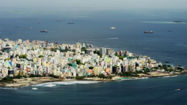 Les Maldives, un paradis touristique menacé par la montée des eaux Les Maldives, un paradis touristique menacé par la montée des eaux