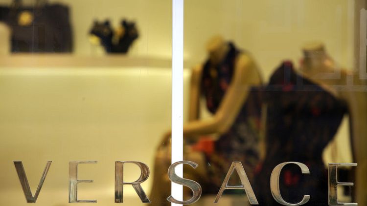 Michael Kors set to snap up Italy's Versace - sources