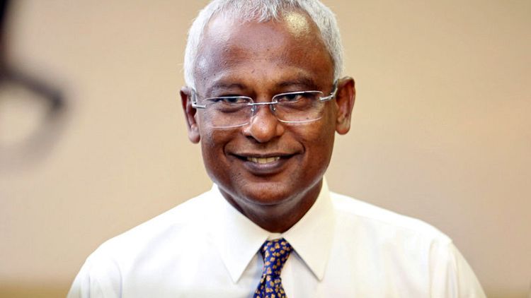New Maldives president a reformer who must hold together diverse coalition