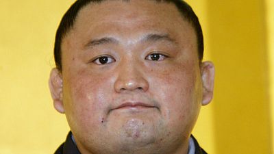 Former top-ranked sumo wrestler resigns following scandal Former top-ranked sumo wrestler resigns following scandal