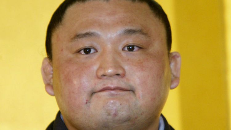 Former top-ranked sumo wrestler resigns following scandal