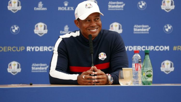 A taste of his Sunday best whets Woods' appetite for battle