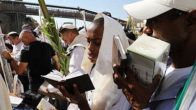 Tens of thousands at Jerusalem's Western Wall for priestly blessing Tens of thousands at Jerusalem's Western Wall for priestly blessing