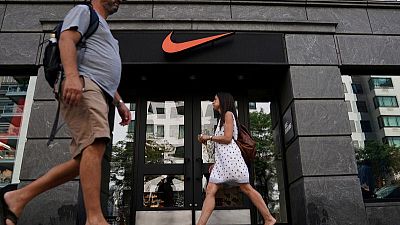 Nike slips as sales outlook dampens investor enthusiasm