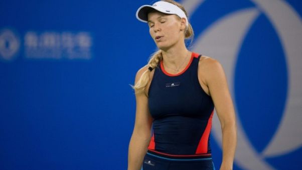 Tennis: Wozniacki sortie, l'hécatombe continue à Wuhan Tennis: Wozniacki sortie, l'hécatombe continue à Wuhan