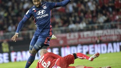 Ligue 1: solide face à Dijon, Lyon enchaîne enfin