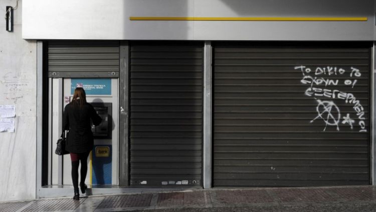 Greece eases capital controls, ends restrictions on cash withdrawals