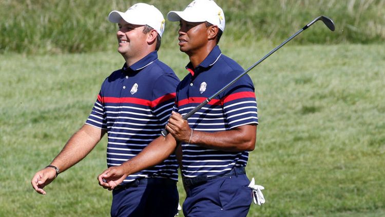 Woods paired with Reed in Ryder Cup opener