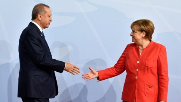 Visite controversée d'Erdogan en Allemagne pour tenter une réconciliation Visite controversée d'Erdogan en Allemagne pour tenter une réconciliation