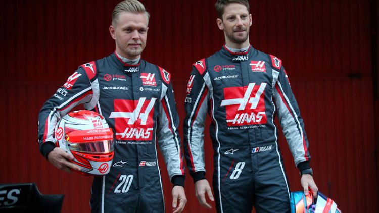 Motor racing - Haas retain Grosjean, Magnussen for next season