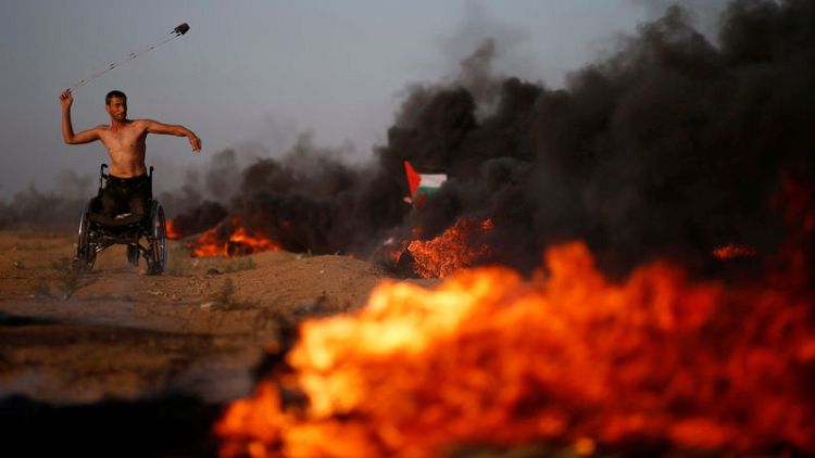 Palestinians say three killed as Israeli troops fire on Gaza protest