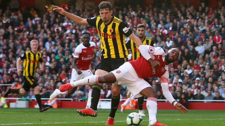 Late goals give Arsenal flattering 2-0 win over Watford