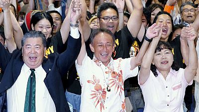 Son of U.S. marine elected Okinawa governor on anti-U.S. base platform
