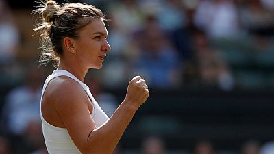 Tennis - Injured Halep retires in first round of China Open Tennis - Injured Halep retires in first round of China Open