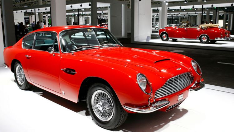 Aston Martin says books covered for IPO