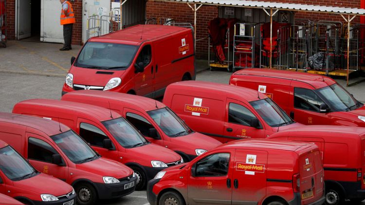 Royal Mail shares slide on profit and costs warning
