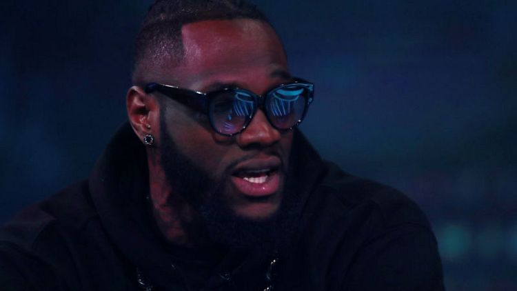 Boxing - Wilder calls out 'coward' Joshua before clash with Fury
