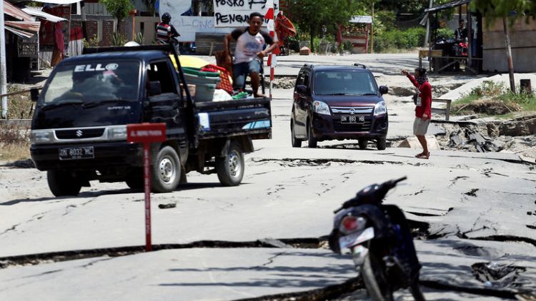 Indonesian leader says 'everyone must be found' as scale of quake disaster emerges