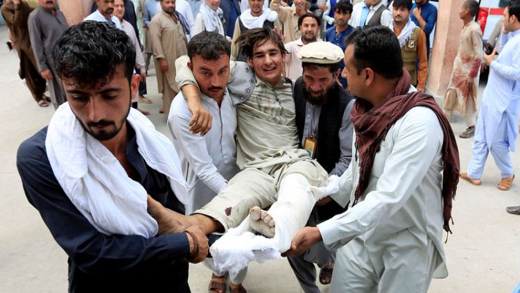 Carnage at Afghan election rally as suicide bomber strikes