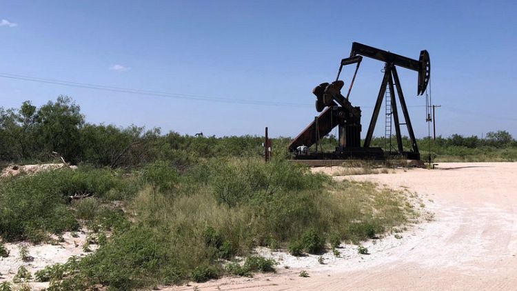 Too much oil? Texas boom outpaces supply, transport networks
