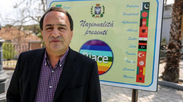 Italian pro-refugee mayor under house arrest on illegal migration charges Italian pro-refugee mayor under house arrest on illegal migration charges