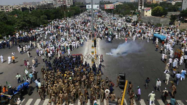 Indian police fire tear gas, water cannon to break up farmers' protest
