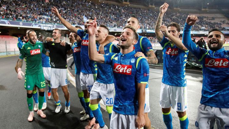 Late winner sends Napoli top with victory over Liverpool