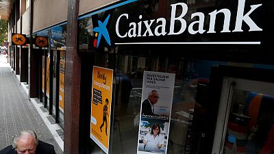 Spanish court to investigate Caixabank's purchase of BPI
