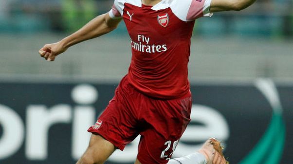 Wins for Arsenal and Milan, Celtic slump in Salzburg Wins for Arsenal and Milan, Celtic slump in Salzburg