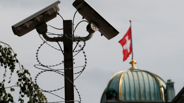 Era of bank secrecy ends as Swiss start sharing account data
