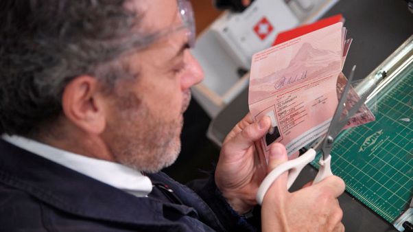 Artist to issue 'Swiss passports' in London installation Artist to issue 'Swiss passports' in London installation