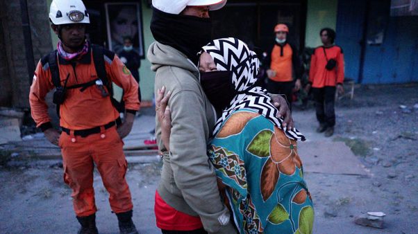 Girl scout among 34 dead found in Indonesian quake quagmire Girl scout among 34 dead found in Indonesian quake quagmire