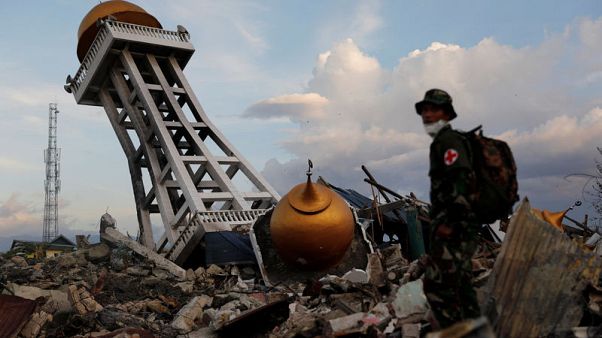 Anger, dismay as Indonesia says search for quake victims to end Anger, dismay as Indonesia says search for quake victims to end