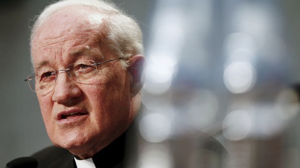 Top Vatican cardinal accuses papal critic of 'calumny and defamation' Top Vatican cardinal accuses papal critic of 'calumny and defamation'