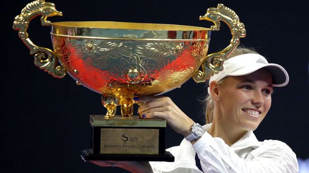 Tennis - Wozniacki swats aside Sevastova to wear Beijing crown Tennis - Wozniacki swats aside Sevastova to wear Beijing crown