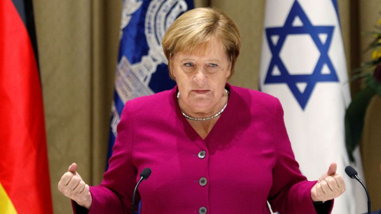 German conservatives back Merkel bid for party leadership