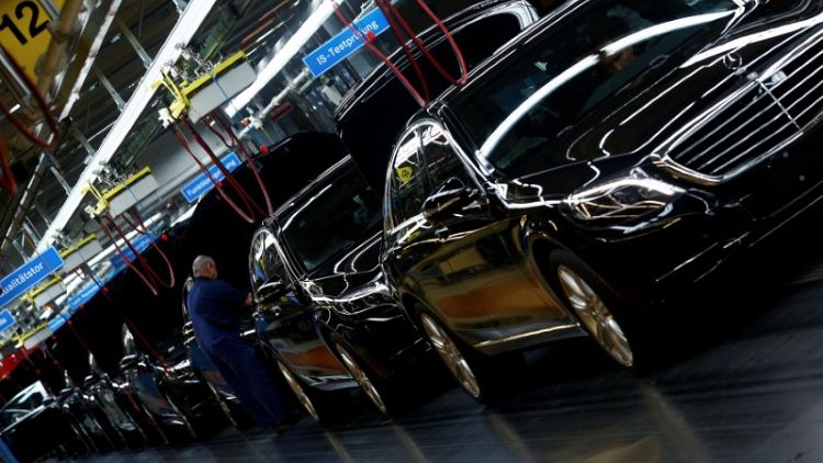 Euro zone investor morale falls on Italy, car industry worries