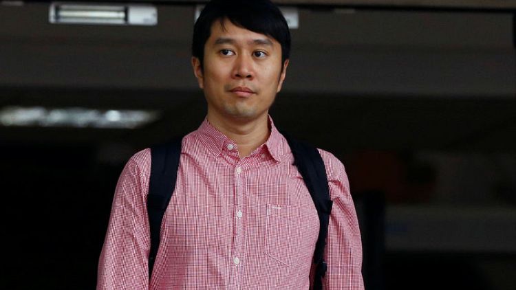Singapore court convicts activist, opposition politician over Facebook comments