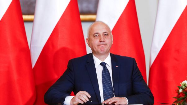 Poland should quit U.N. migration pact, minister says Poland should quit U.N. migration pact, minister says