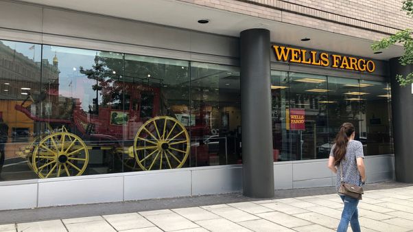 Wells Fargo touts good deeds to get back in lawmakers' good graces Wells Fargo touts good deeds to get back in lawmakers' good graces