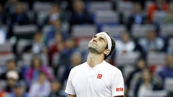 Federer battles past Bautista Agut in Shanghai Federer battles past Bautista Agut in Shanghai