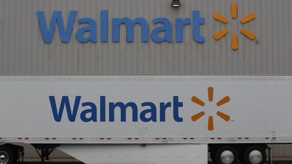 Walmart to pay $65 million to settle lawsuit over seating for cashiers Walmart to pay $65 million to settle lawsuit over seating for cashiers